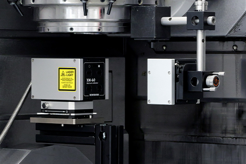 Calibrador multi-eje XM-60 utilizado para ejecutar un ensayo en una máquina