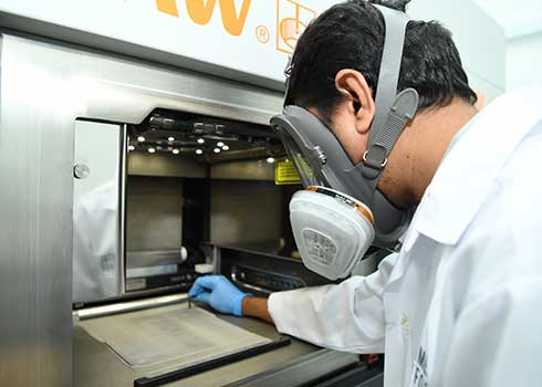 The build chamber of Renishaw's AM system