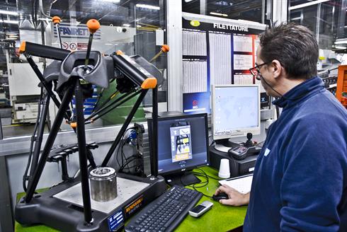 An operator measures a part on Equator at ZF Marine
